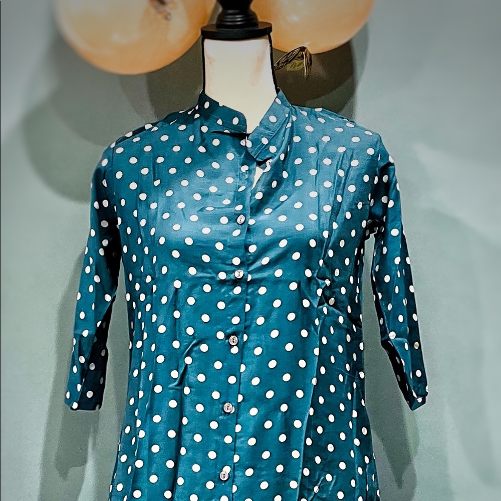 Long length button down 100% cotton shirt. Sizes S. M. L available